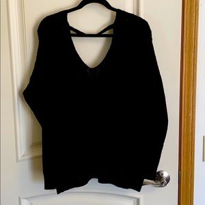 Black sweater with exposed back